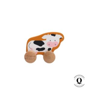 Vauvan lelu lehmä pyörillä